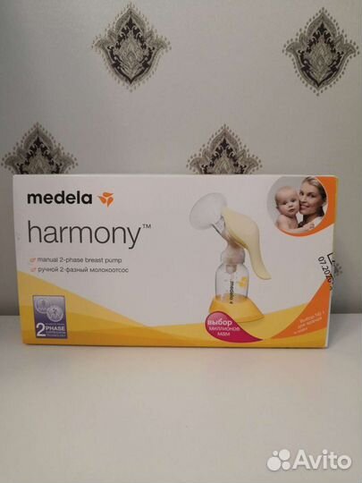 Молокоотсос medela ручной