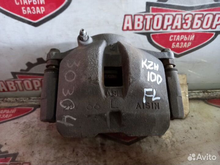 Суппорт тормозной передний левый Toyota Hiace