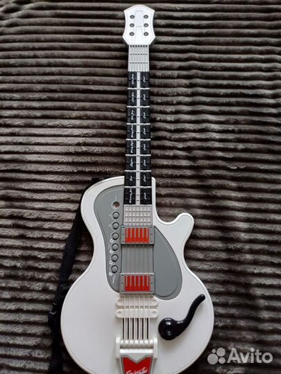 Гитара игрушка