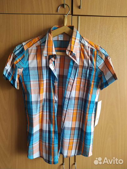 Рубашка новая для мальчика 140
