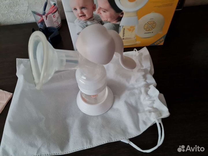 Молокоотсос medela swing электрический
