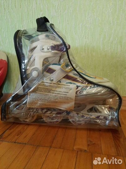 Роликовые коньки