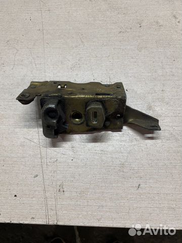 Дверной замок передний левый волга 3102