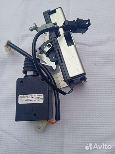 Замок двери задн.лев. в сборе с эл.прив. Ш.-Нива