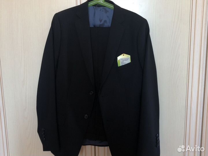 Новый школьный костюм 152