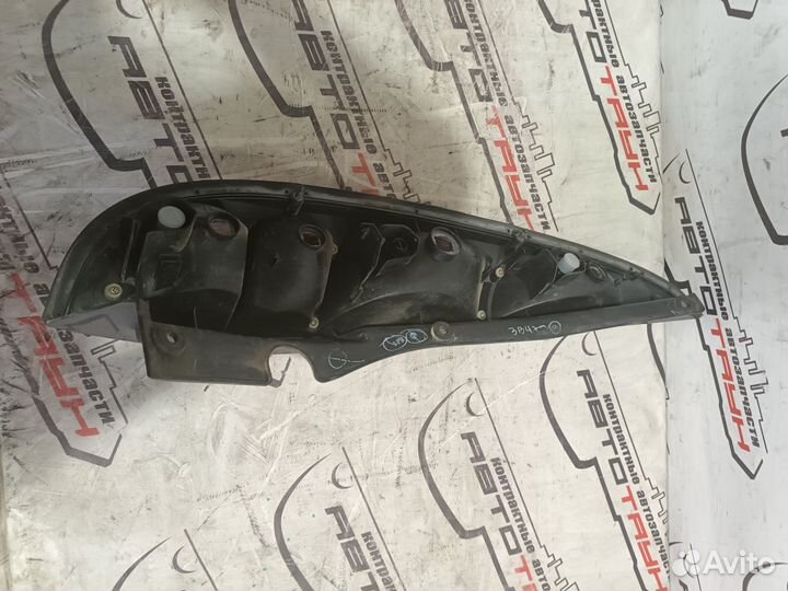 Фонарь nissan tino HV10 PV10 V10 22063522 правый 265504U025 NA5749