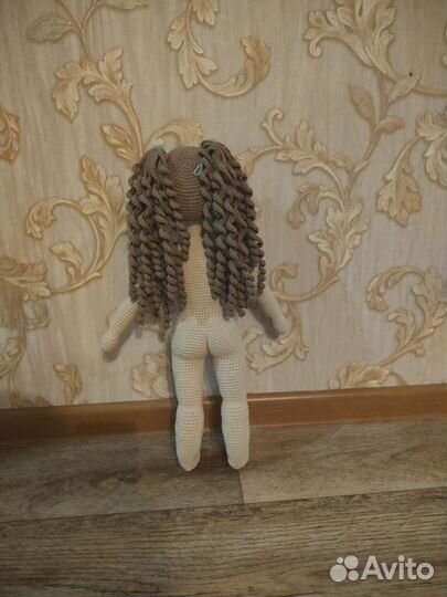 Вязаная кукла ручной работы