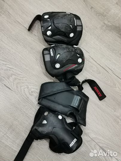 Роликовые коньки и защита