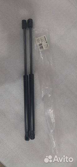 Амортизатор задней двери Opel Astra