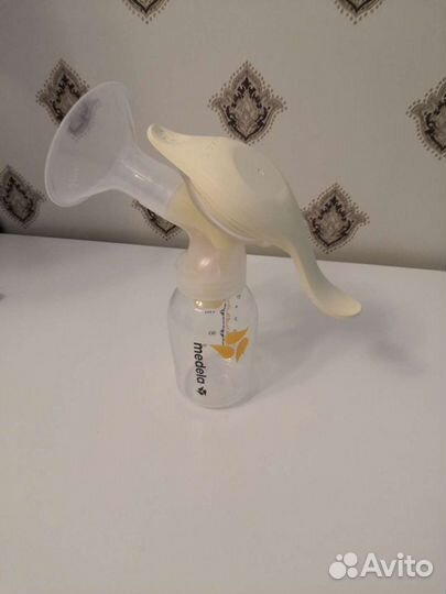 Молокоотсос medela ручной