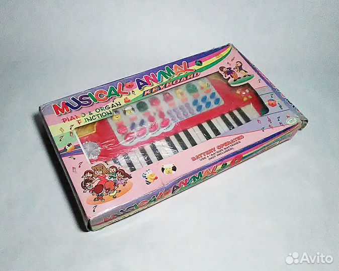 Музыкальная игрушка (пианино и орган) для малышей