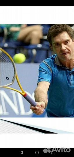 Тренер по большому теннису