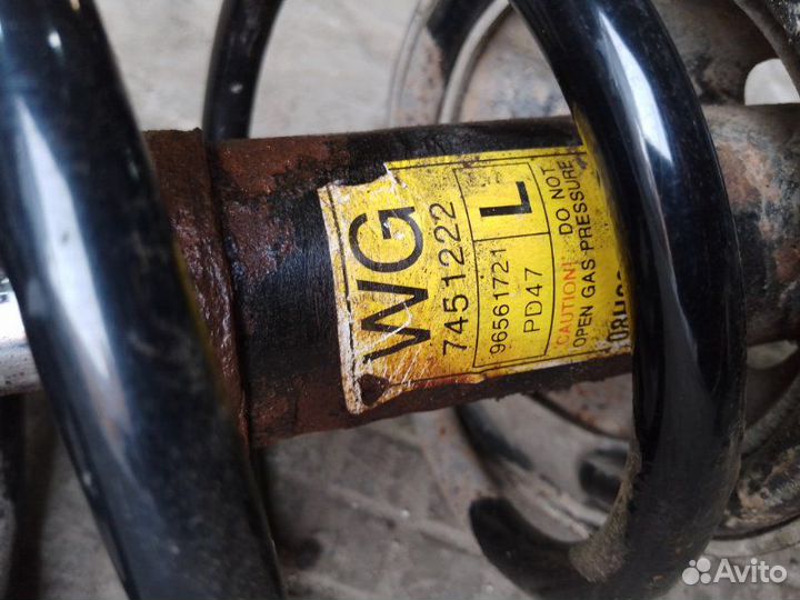 Амортизатор передний левый Chevrolet Lacetti седан