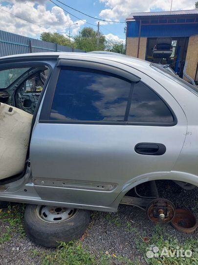 Дверь задняя левая Nissan sunny N16