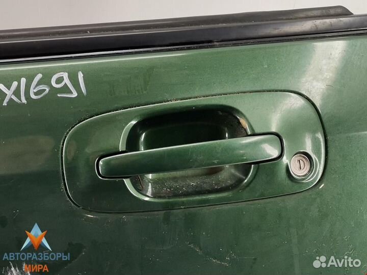 Обшивка двери передняя левая Subaru Impreza