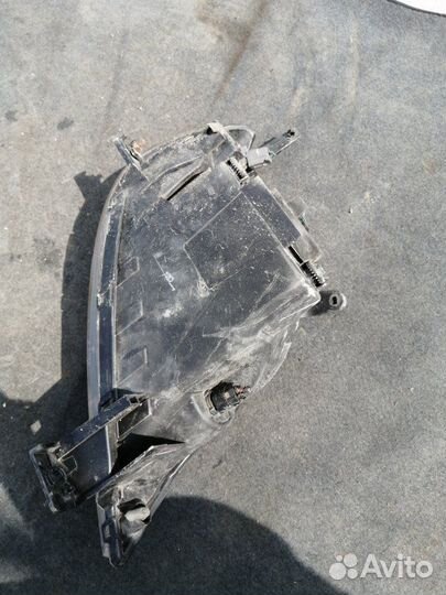 Фара левая Mazda Demio DY3W