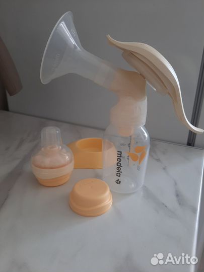 Молокоотсос medela ручной