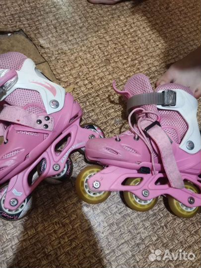 Роликовые коньки