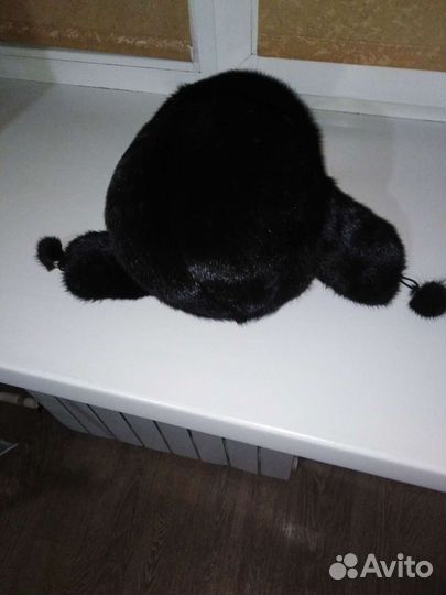 Женские меховые шапки