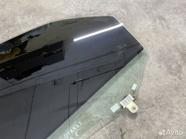 Стекло двери задней левой Kia Cerato (TD) II (2008