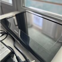 Телевизор вместе с кронштейном