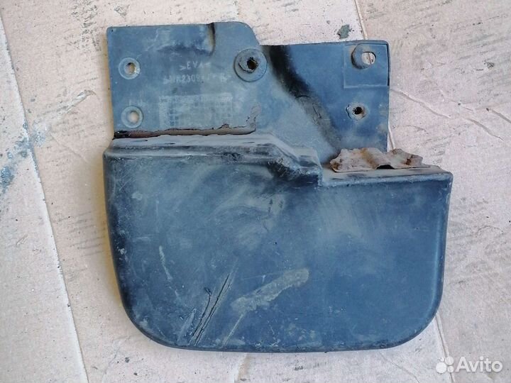 Брызговик Mitsubishi Pajero Sport 1 MR230943 зад L