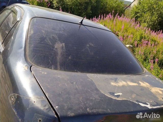 Стекло заднее Toyota Carina E