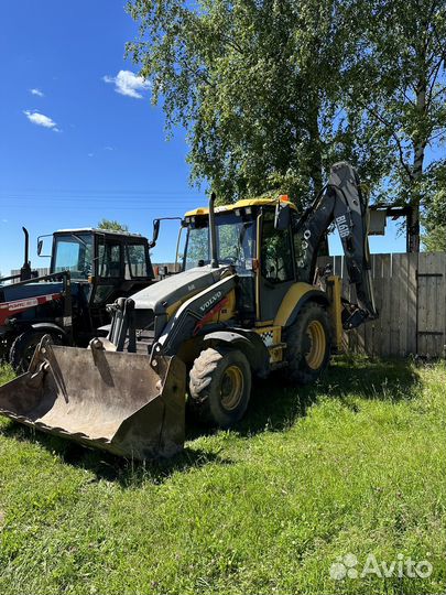 Услуги эксковатора-погрузчика