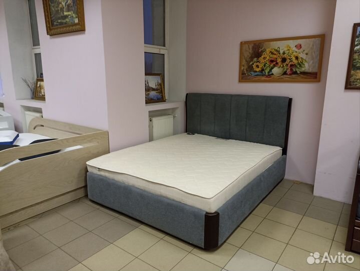 Кровать с подъемным механизмом