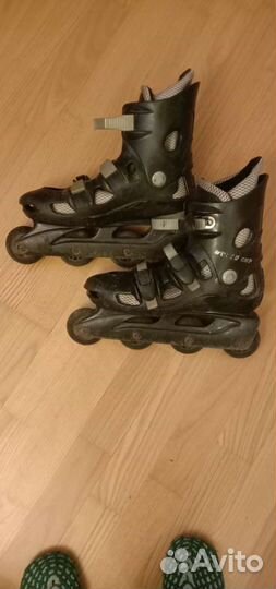 Роликовые коньки