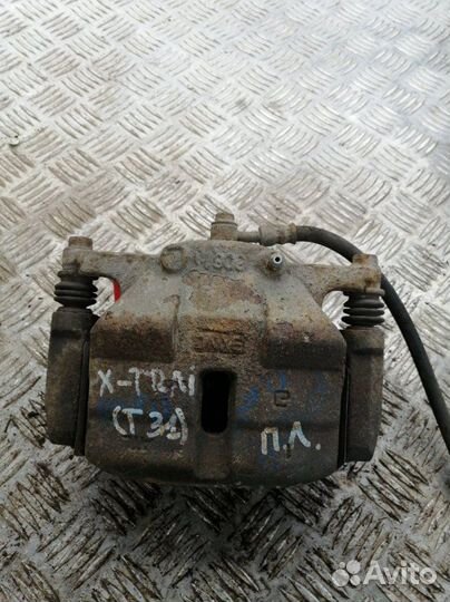 Суппорт передний левый Nissan X-Trail T31 2.0