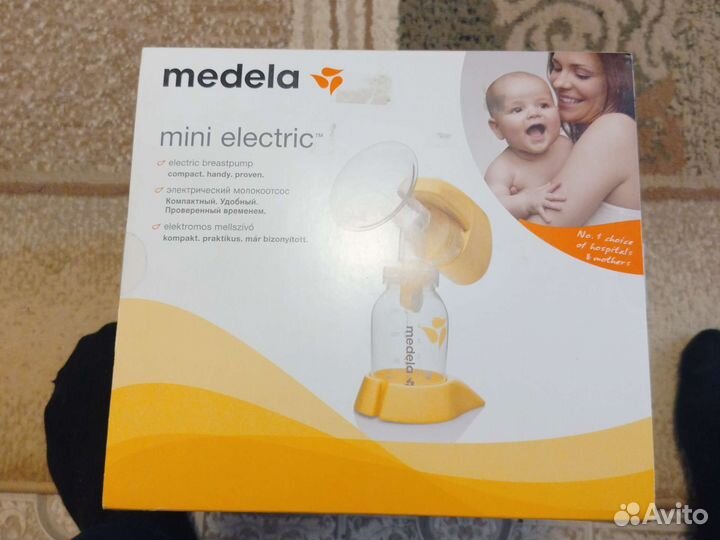Молокоотсос medela электрический новый