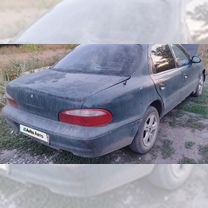 Kia Clarus 2.0 MT, 1998, 300 000 км, с пробегом, цена 130 000 руб.