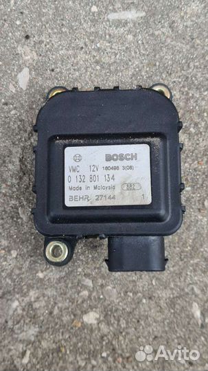 Моторчик заслонки отопителя Астра G Зафира А