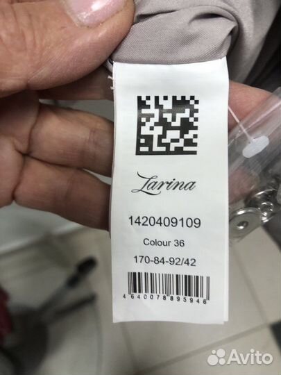 Пуховик новый Zarina