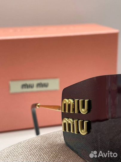 Очки miu miu солнцезащитные