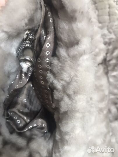 Меховая жилетка