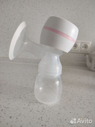 Молокоотсос электрический новый