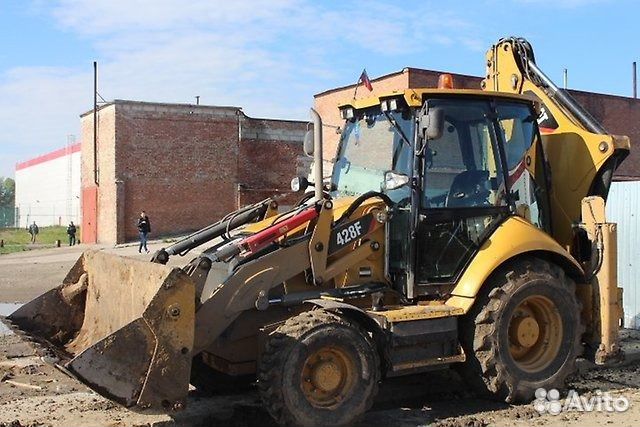 Экскаватор погрузчик caterpillar