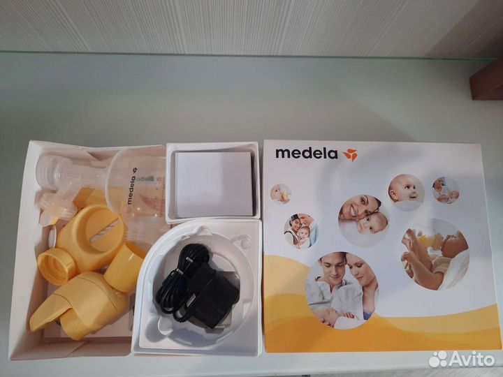 Молокоотсос medela электрический