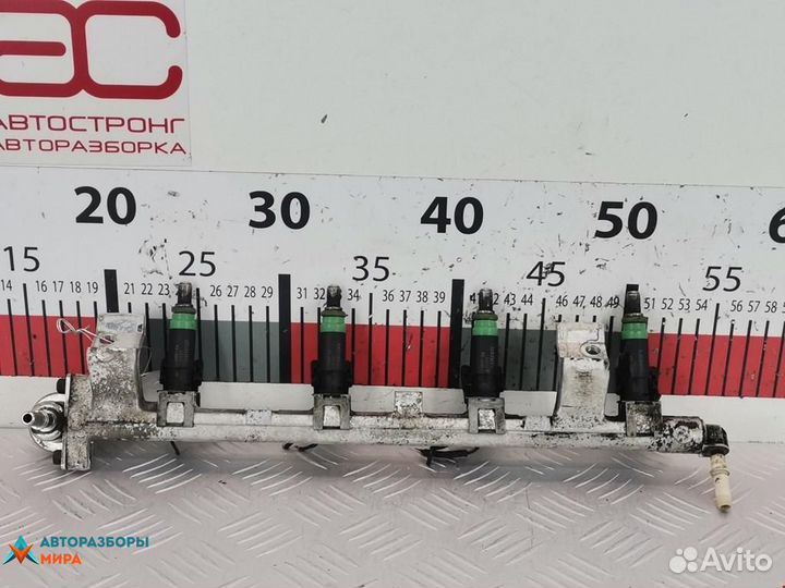 Форсунка Ford Focus 2000 1429840