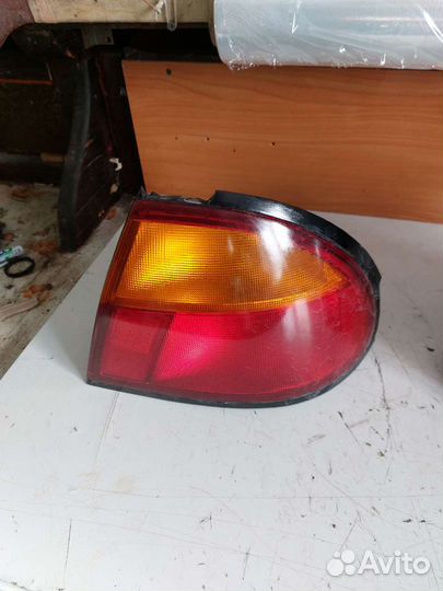 Фонарь задний Mazda 323
