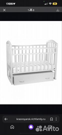 Детская кроватка с маятником и ящиком