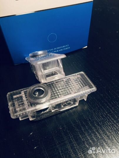 Штатная подсветка с логотипом в двери BMW E70 F16