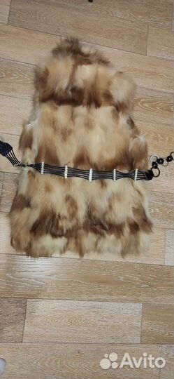 Меховая жилетка