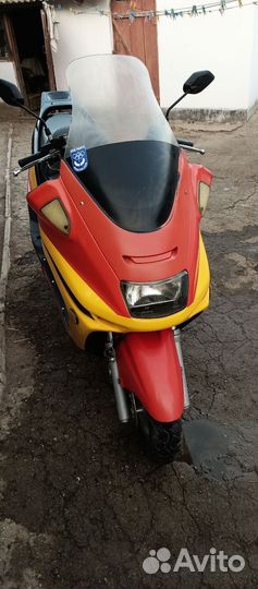 Макси скутер