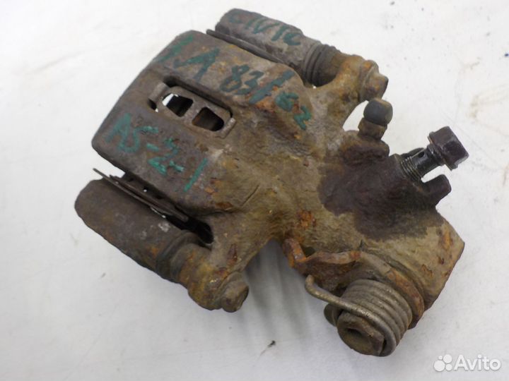 Суппорт тормозной задний левый Honda Civic VII 200