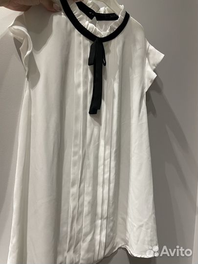 Продаёт белая блузка