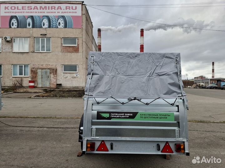 Легковой прицеп Титан 2,5х1,3 борт 0,5м тент 0,6м
