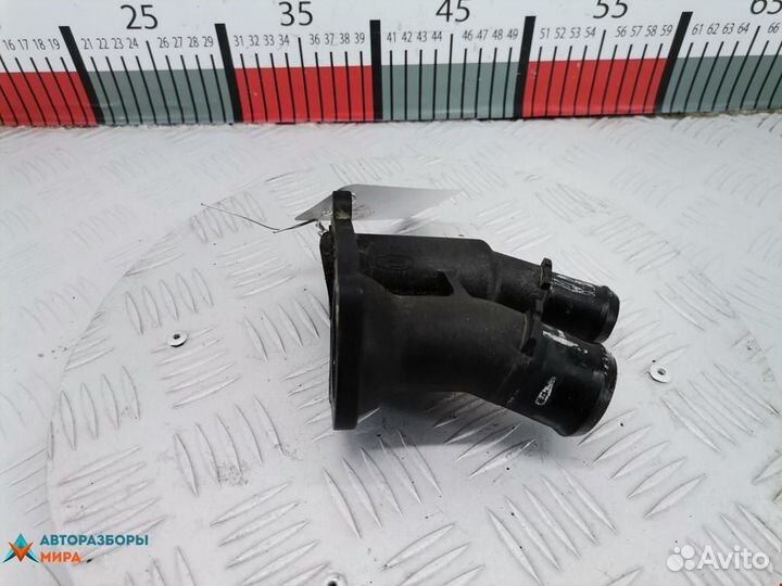 Корпус термостата Ford Fiesta 5 рест. 2010